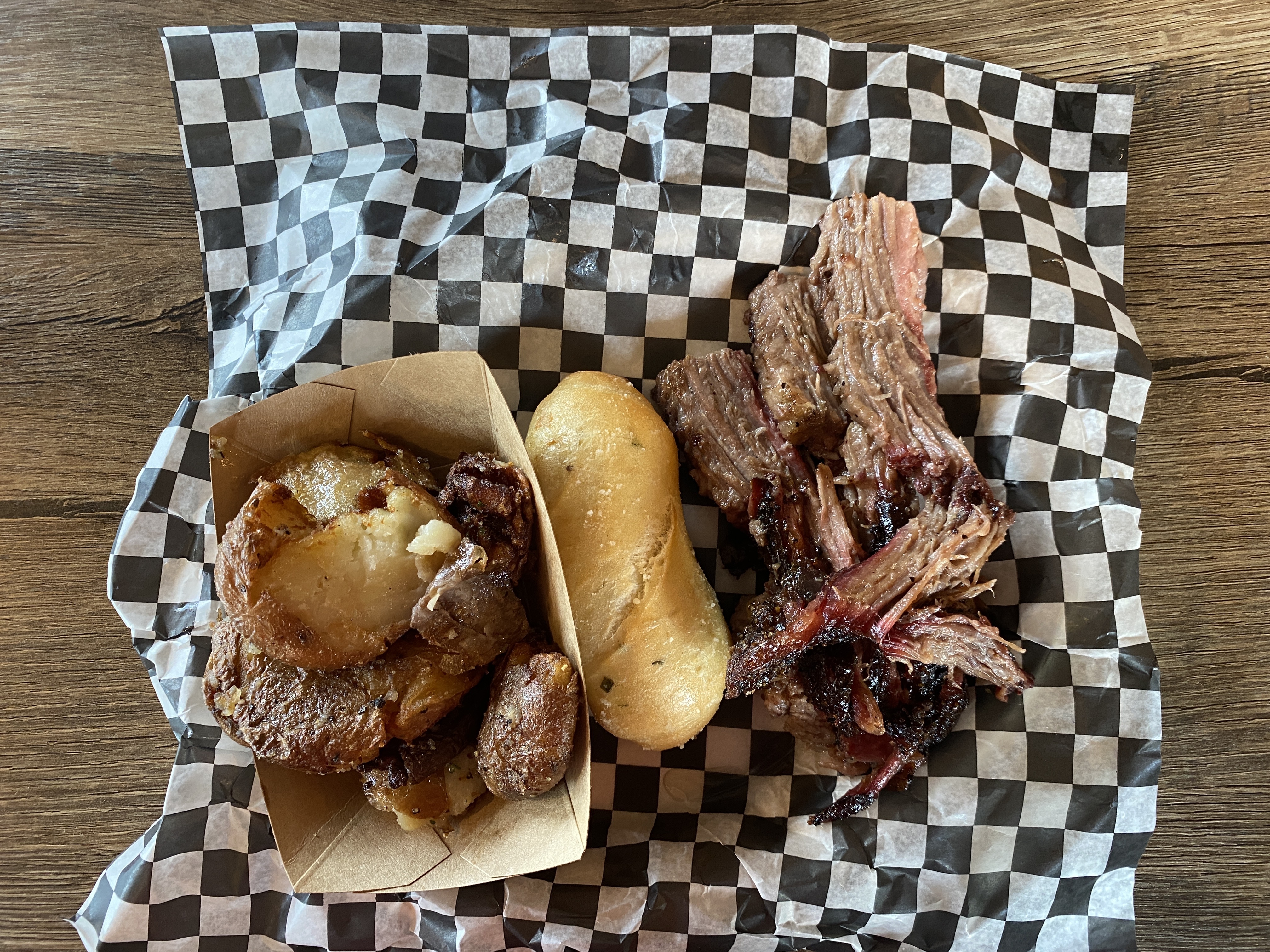 The beef brisket is carved right in front of the serving
      line.