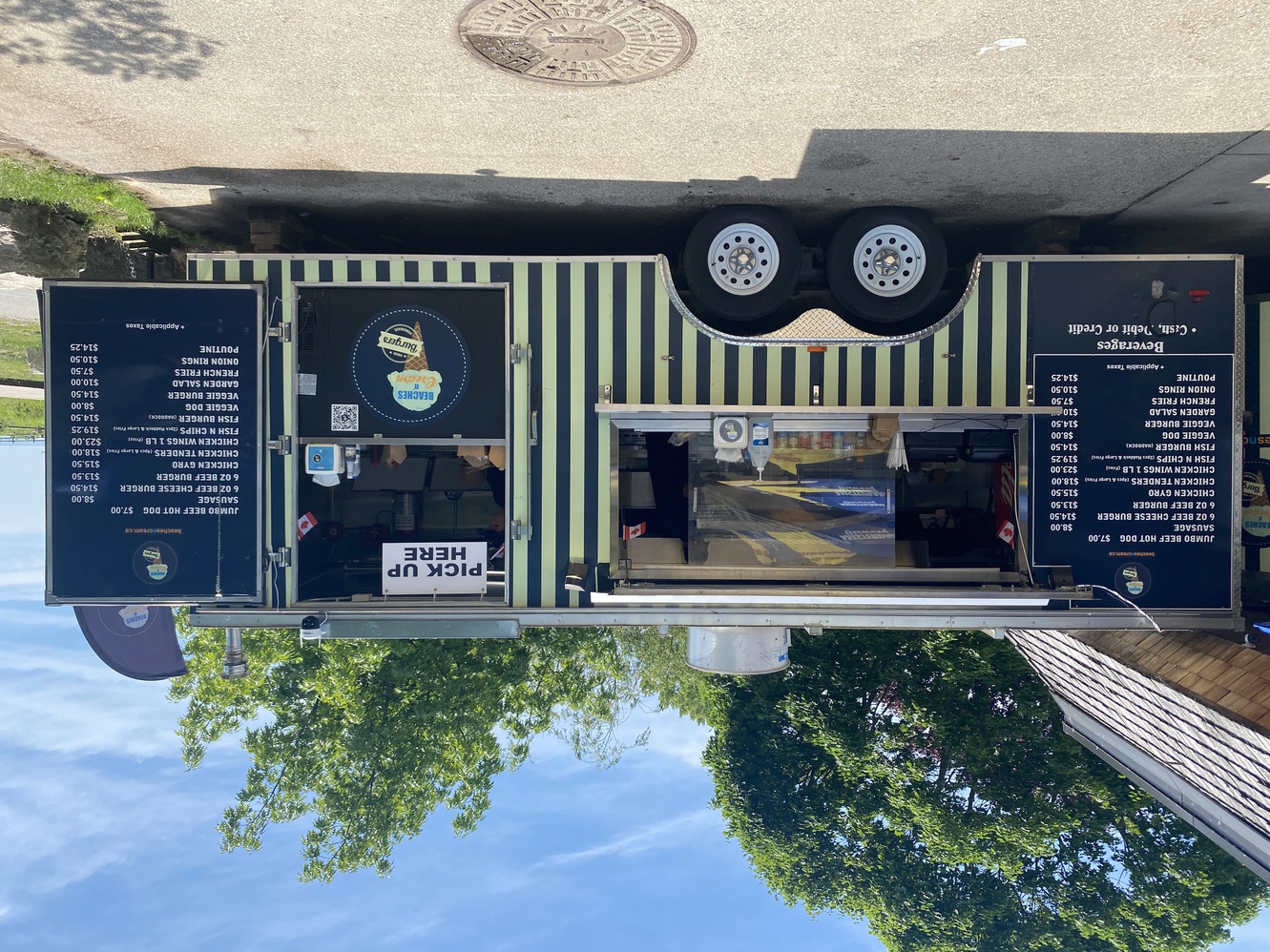 The food truck
      has hotdogs, hamburgers, fish sandwiches, chicken fingers, and
      poutine.