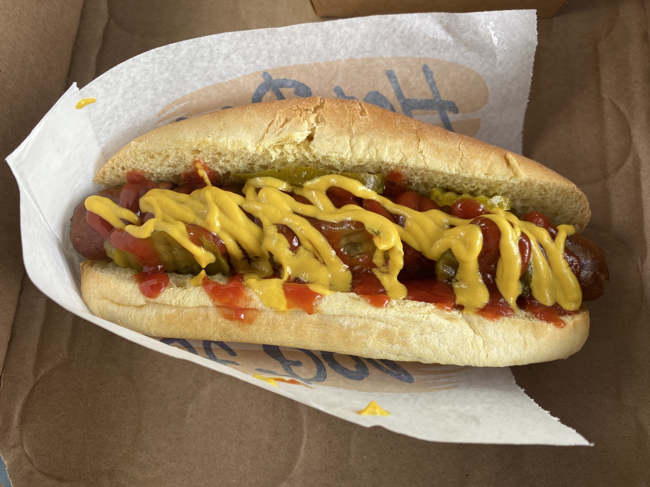 This is a
      hotdog, well-dressed by the food truck attendant; cost of $7.